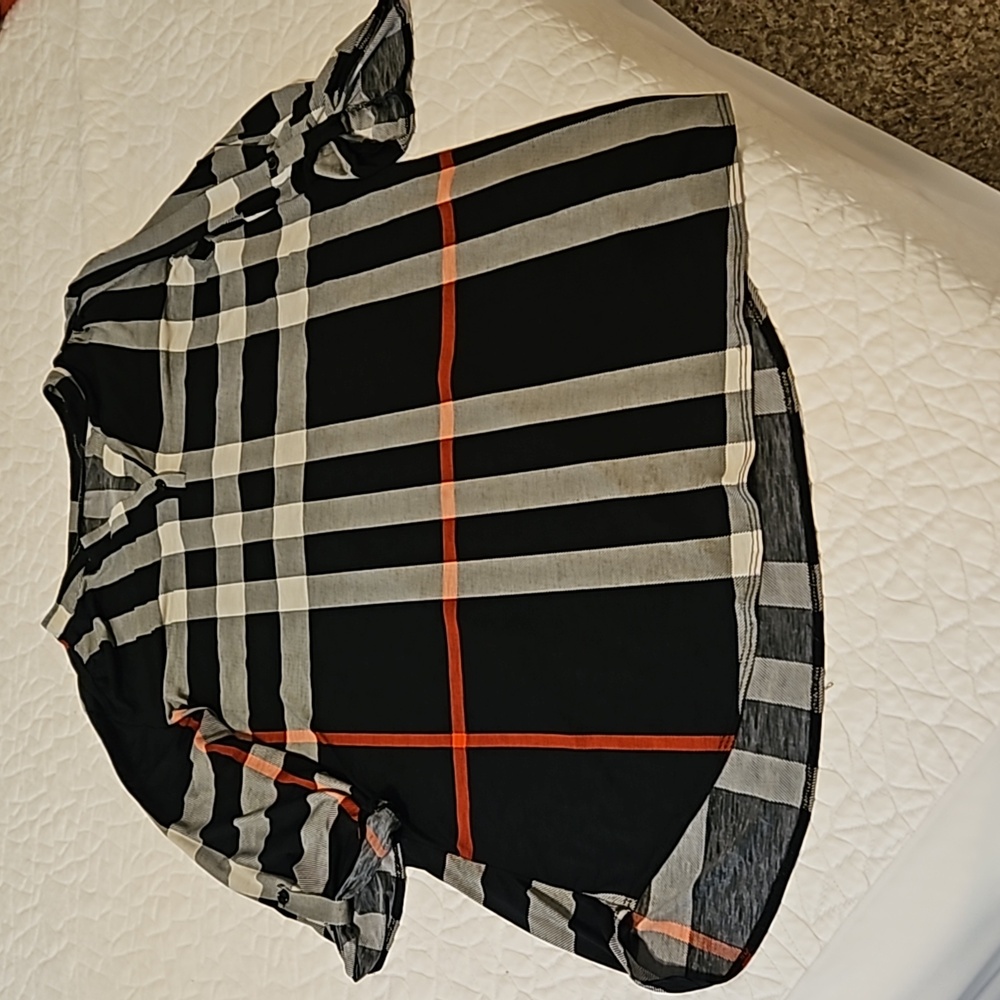 Checked dress plaid with half button sleeves. V Neck